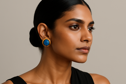 Elegant Indian model wearing blue stone earrings