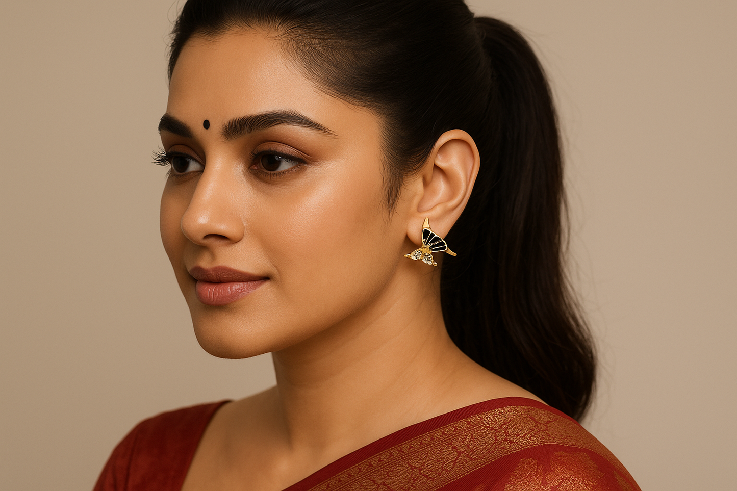 Elegant Indian model wearing butterfly earrings - jewelry shoot portrait