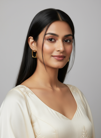 Elegant Indian model wearing gold square hoop earrings
