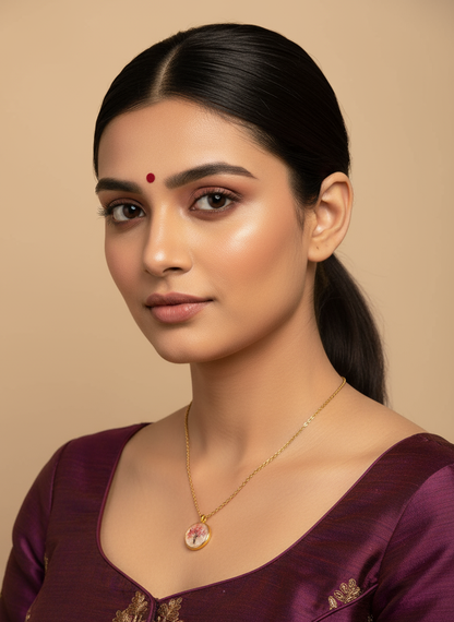 Elegant Indian model wearing pink floral resin necklace