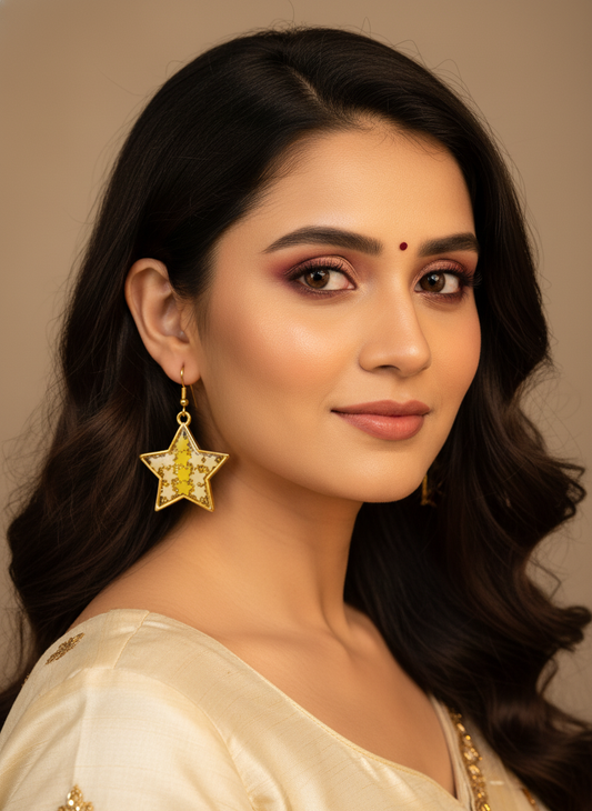 Elegant South Indian model wearing star confetti earrings
