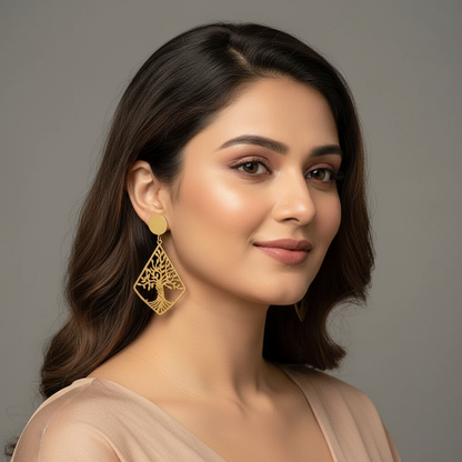 Indian model wearing gold Tree of Life earrings
